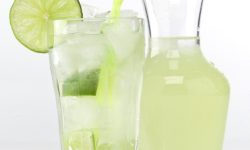 Glass and pitcher of cucumber limeade